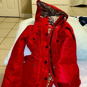 Beautiful red jacket can use as rain jacket with cozy leopard print in coat.